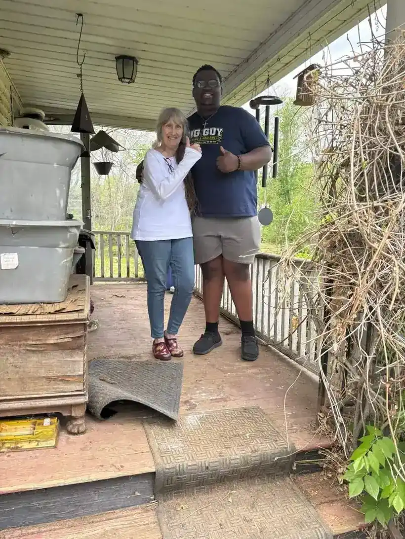 Aaron with a happy customer after her move